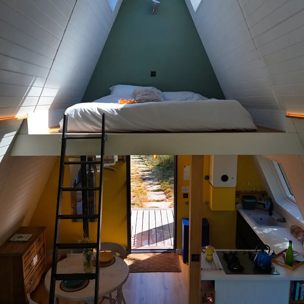 Mezzanine bed in the apex of the A Frame, reached by a ladder